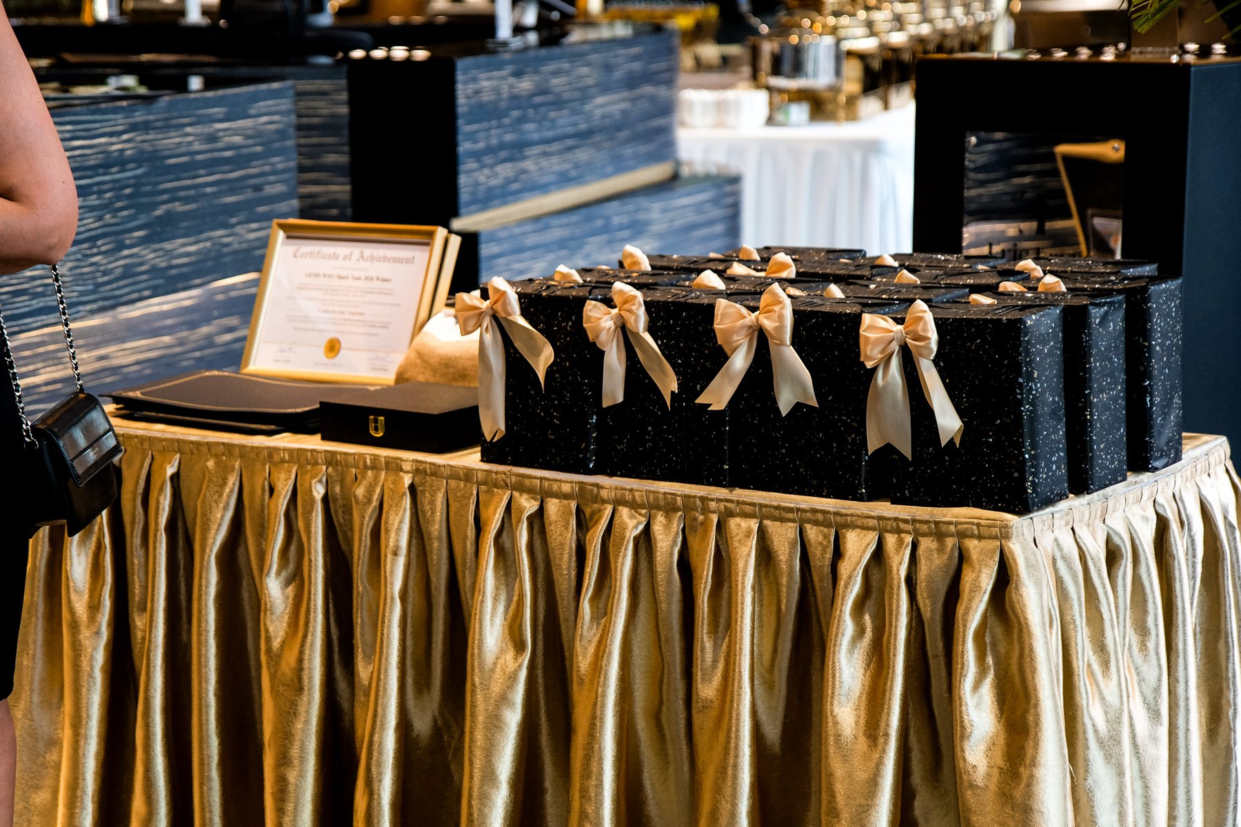 Certificates and commemorative awards displayed at the ceremony