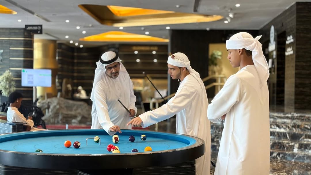 Mr. Ghanim Al Falasi showing Target Pool to Dubai College of Tourism students during the centre tour