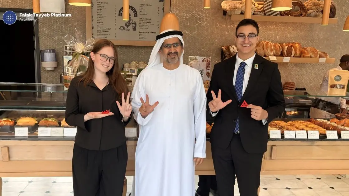 Student interns with an FTP leader during a workplace-learning experience