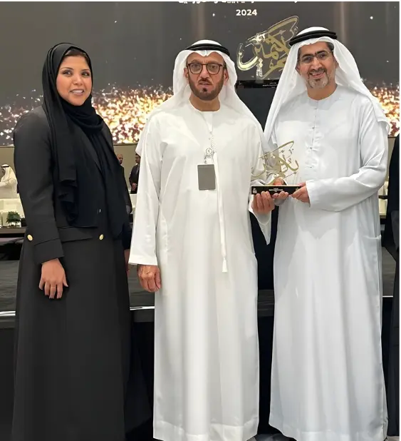Falak Tayyeb Platinum representatives receiving recognition at a 2024 ceremony